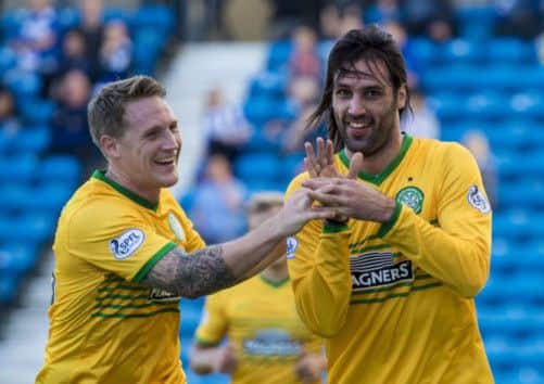 Georgios Samaras celebrates his second goal with fellow scorer Kris Commons. Picture: SNS