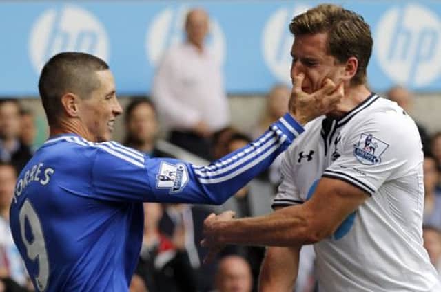Chelseas Fernando Torres, left, gets to grips with Tottenham defender Jan Vertonghen. Picture: Getty