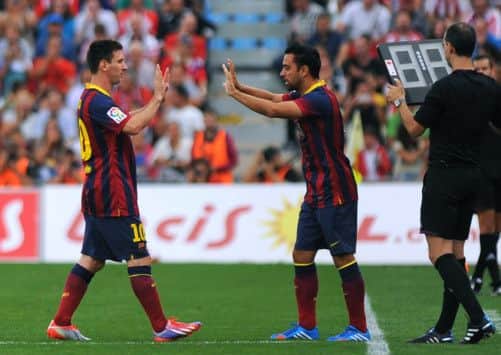 Lionel Messi leaves the pitch during his side's 2-0 win. Picture: Getty