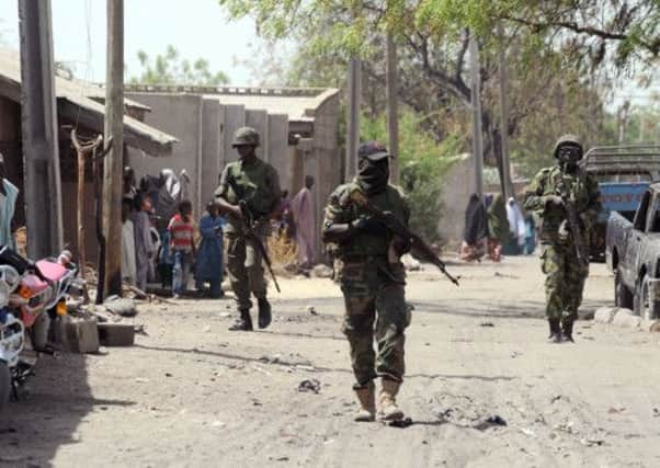 Nigerian troops patrol after a Boko Haram attack in the north east of the country earlier this year. File photo: Getty