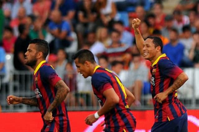 Adriano, right, celebrates Barcelona's second goal. Picture: Getty