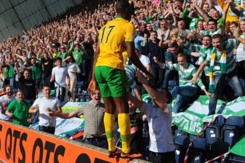 Amido Balde celebrates with the crowd after scoring his first goal for Celtic on Saturday. Picture: Robert Perry