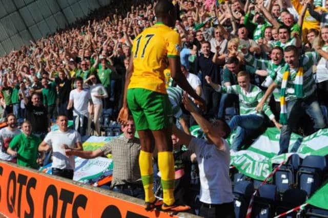 Amido Balde celebrates with the crowd after scoring his first goal for Celtic on Saturday. Picture: Robert Perry