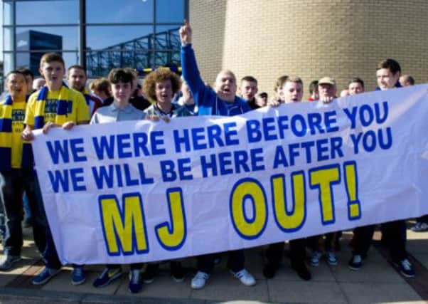 Kilmarnock fans make their feelings known towards Chairman Michael Johnston outside Rugby Park. Picture: SNS