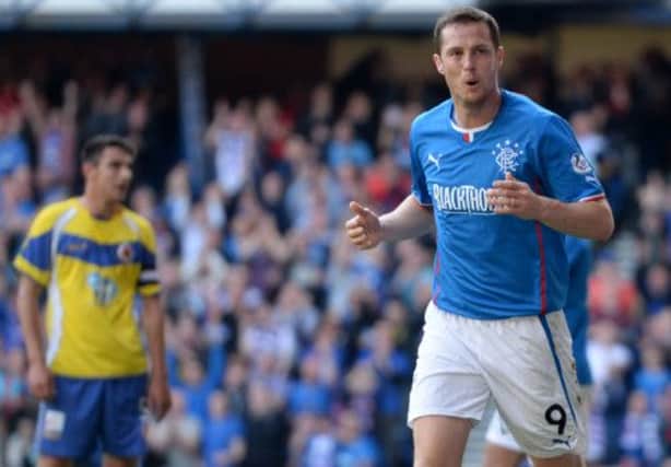 Jon Daly celebrates one of his four goals during Rangers' 8-0 rout against Stenhousemuir. Picture: SNS