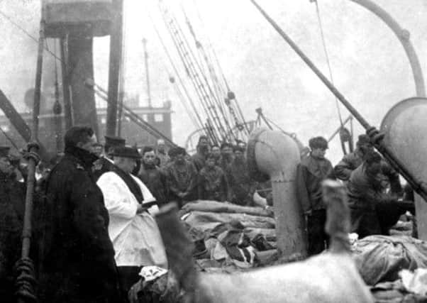 Titanic victims are laid out on the deck of the CS Mackay Bennett. Picture: Henry Aldridge and Son/PA