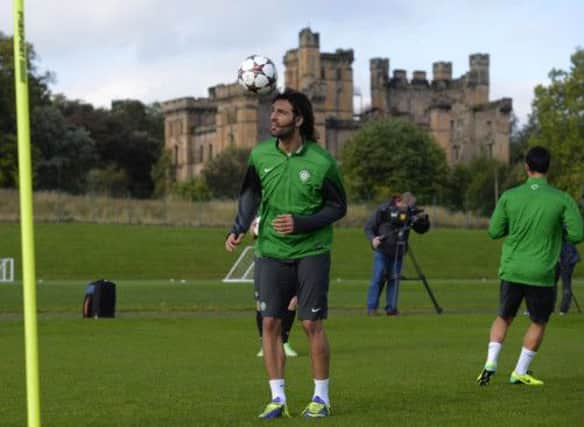 Georgios Samaras limbers up in training at Lennoxtown yesterday ahead of this evening's Champions League clash with Barcelona. Picture: Reuters