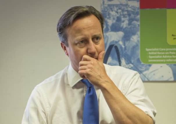 David Cameron  at a meeting with a group of health workers in Manchester yesterday. Picture: Reuters