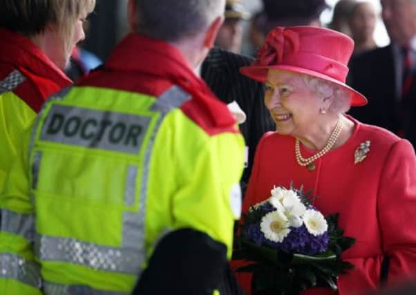The Queen talks to patients and staff as she officially opens an emergency care centre at Aberdeen Royal Infirmary's Foresterhill campus. Picture: PA