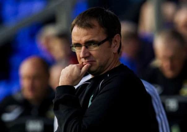 Hibernian manager Pat Fenlon watches as his sides sixgame unbeaten run ended at Inverness. Picture: SNS