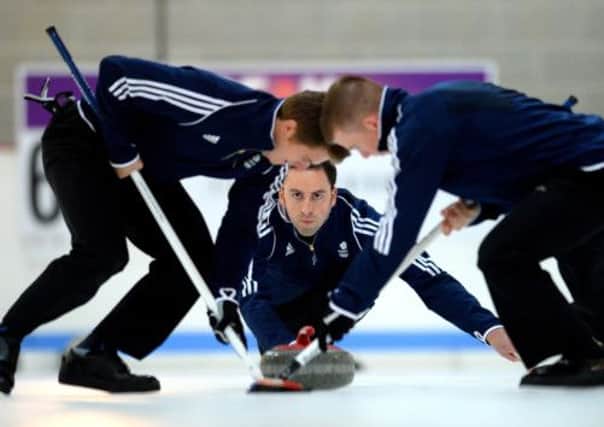 David Murdoch hopes to take care of the unfinished business  of an Olympic medal in Sochi next February. Picture: Getty