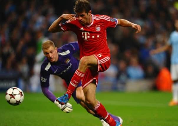 Thomas Muller scores the second as Bayern outclass Manchester City at the Etihad. Picture: Getty Images