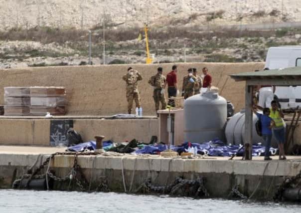 The retrieval operation is underway at the port of Lampedusa. Picture: AP