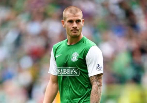 James Collins feels his game has improved since Paul Heffernan signed for Hibs. Picture: SNS