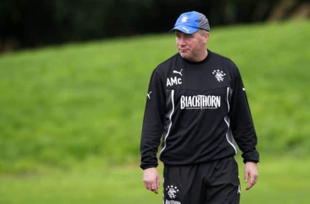 Ally McCoist keeps an eye on his side's training session. Picture: SNS