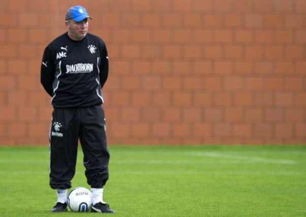 Rangers manager Ally McCoist keeps an eye on his side's training session. Picture: SNS