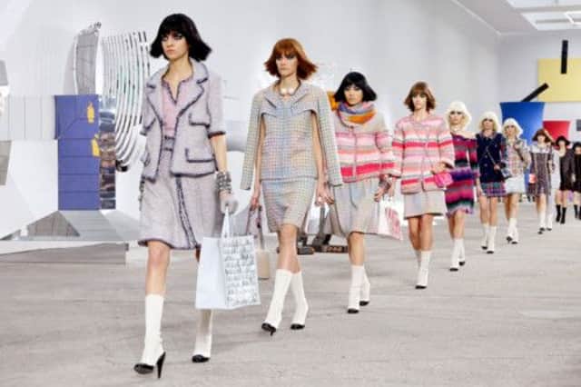 Models walk the runway at the Chanel show during Paris Fashion Week Womenswear Spring/Summer 2014. Picture: Getty