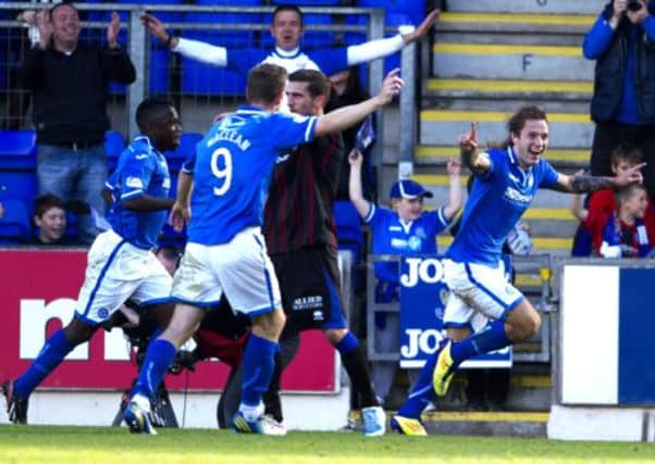 St Johnstone star Stevie May (right) celebrates his opener. Picture: SNS