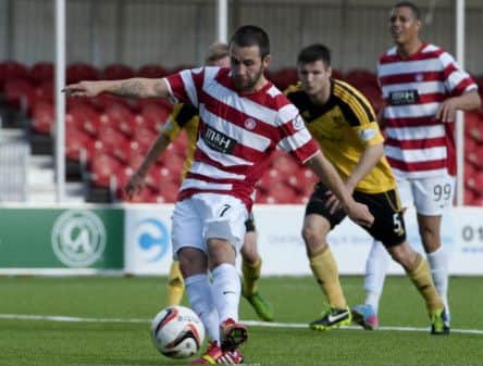 Hamilton's James Keatings slots home his penalty kick to put his side 1-0 up yesterday. Picture: SNS