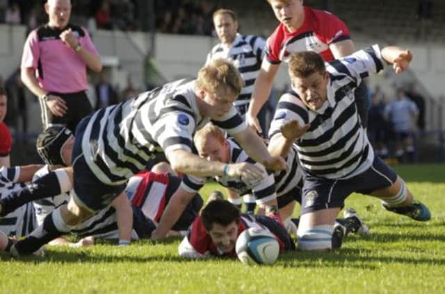 Jack Turley and Alex Henderson go for the ball for Heriots but no try was given. Picture: Toby Williams