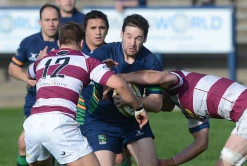 Boroughmuir's David Reekie runs into Ross Aitken and Matt Poole of Watsonians. Picture: Neil Hanna