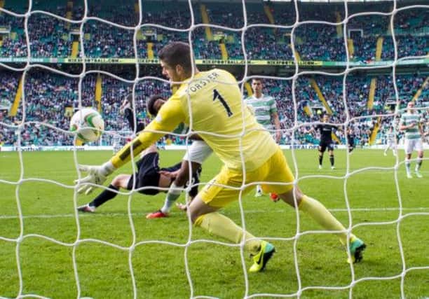 Fraser Forster pulls off a save during Celtic's win over Motherwell. Picture: SNS