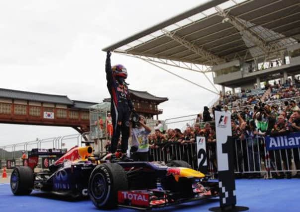 Sebastian Vettel greets the crowds after yet another Grand Prix win in Korea. Picture: Getty