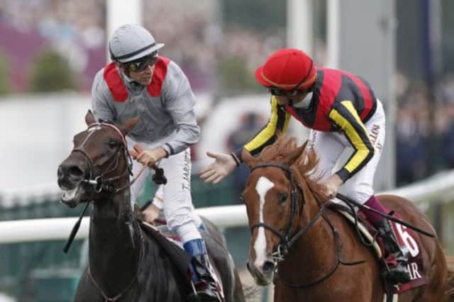 Treve, left, beat favourite Orfevre, right, by five lengths, even winning the plaudits  of the many Japanese fans who had to settle for second again.  Picture: AP