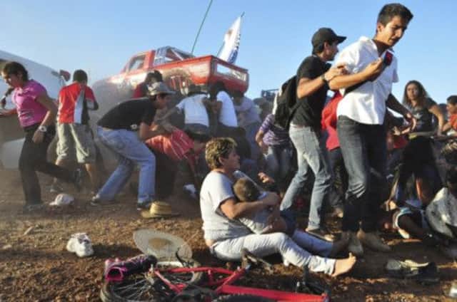Spectators at the rally were left frightened and confused after the monster truck ploughed into the crowd. Picture: Reuters
