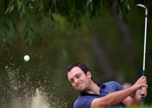 Francesco Molinari of the European team plays a shot during the second day's fourballs at the Seve Trophy. Picture: Getty