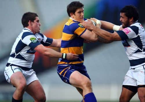 Sam Beard under pressure from All Black scrum-half Piri Weepu in the ITM Cup. Picture: Getty