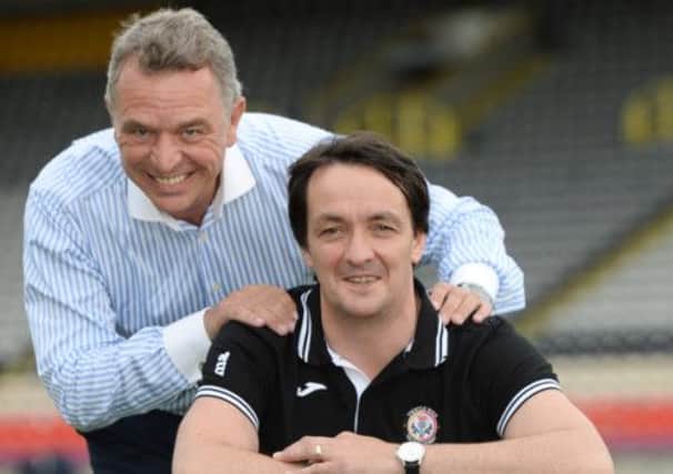 Thistle chairman David Beattie, left, and academy head Gerry Britton. Picture: SNS