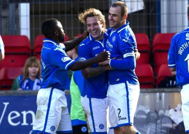 Stevie May (centre) celebrates his goal against ICT with Nigel Hasselbaink (left) and Dave Mackay. Picture: SNS