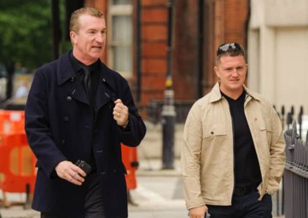 EDL leaders Kevin Carroll, left, and Tommy Robinson are to leave the group. Picture: PA