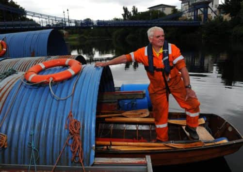George Parsonage on the pontoon at the Glasgow Humane Society in Glasgow Green. Picture: Robert Perry