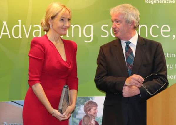 JK Rowling and Principal Sir Timothy O'Shea during the opening of The Anne Rowling Regenerative Neurology Clinic. Picture: PA