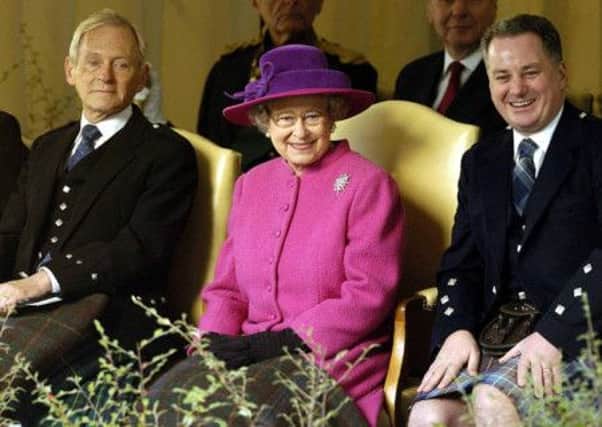 The Queen at the opening of Scottish Parliament with the then presiding officer George Reid and first minister Jack McConnell. Picture: Reuters