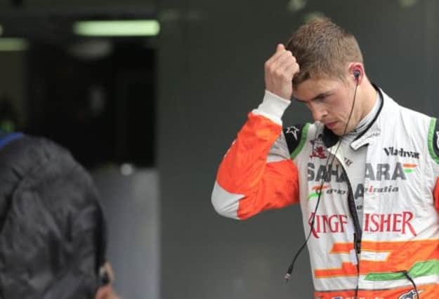 Force Indias Paul di Resta walks into the pits during Belgium Formula One Grand Prix. Picture: Getty