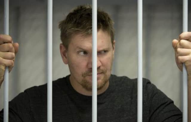 Activist Anthony Perrett, one of six Britons detained, appears in a Russian court. Picture: AP