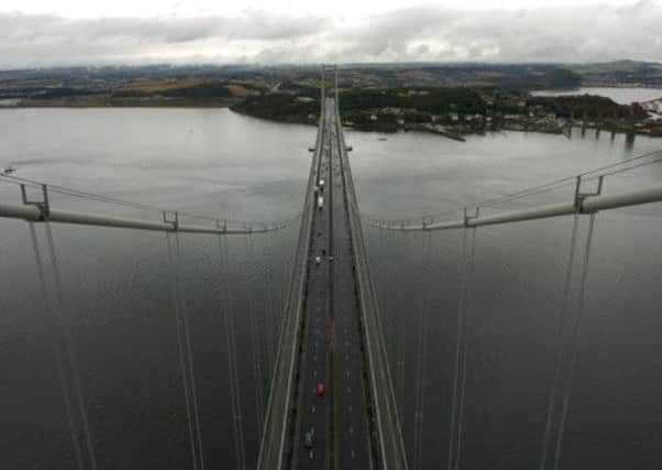 Climbers will scale the Forth Road Bridge next year. Picture: Johnston Press