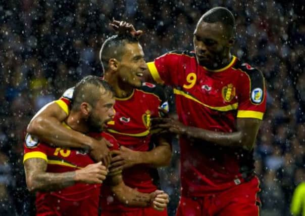 Belgian players celebrate during their 2-0 victory over Scotland. Picture: SNS