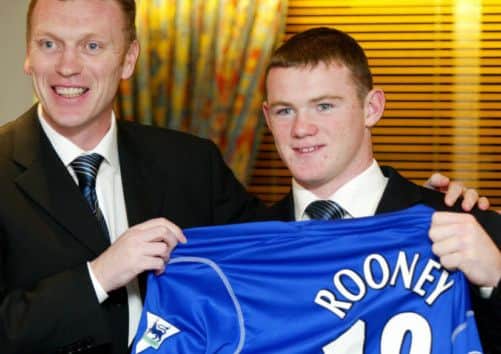 David Moyes and Wayne Rooney in 2003. Picture: PA