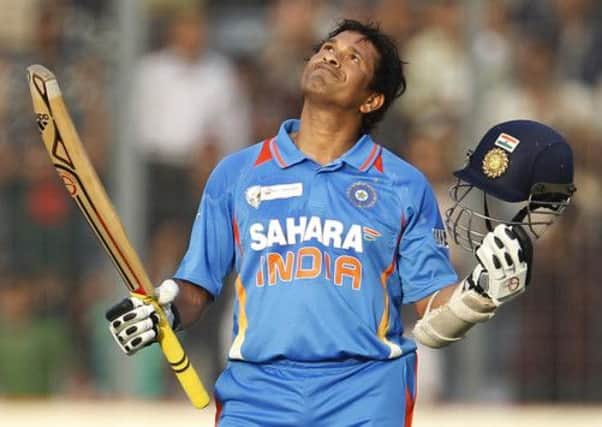 Sachin Tendulkar, pictured above celebrating his 100th century during the Asia Cricket Cup match against Bangladesh, is to retire. Picture: AP