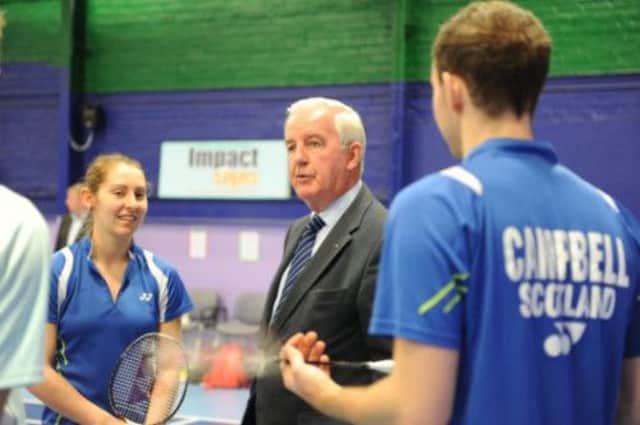Sir Craig Reedie, centre, meets Kirsty Gilmour and Martin Campbell during his visit to the Cockburn Centre badminton centre in Glasgow