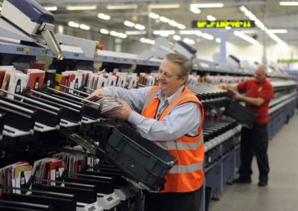 Royal Mail staff are being given free shares in the privatised company. Picture: Julie Bull
