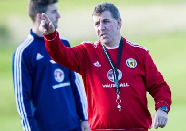 Scotland assistant manager Mark McGhee leads training. Picture: SNS