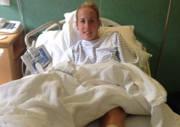 A relieved Lynsey Sharp recovers in hospital after successful surgery to resolve a painful tendon condition in her leg. Picture: Contributed