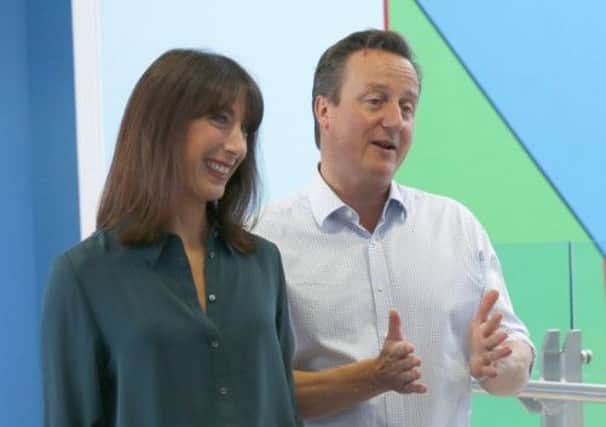 Prime Minister David Cameron together with wife Samantha following his tax break for couples statement. Picture: Reuters