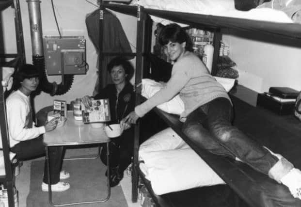A family breakfast in an underground shelter during a five-day trial in 1980. Picture: Getty