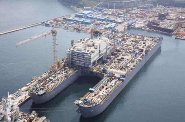 The giant catamaran Pieter Schelte, shown here under construction in Okpo, South Korea, is scheduled to start removing rigs from the North Sea in 2015.  Picture: Reuters